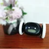 “robotic alarm clock with flashing eyes”